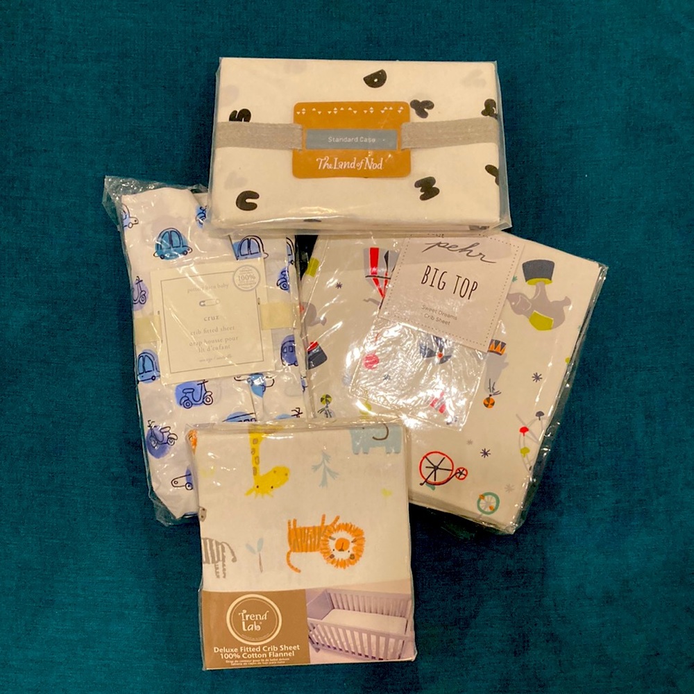 Bundle of crib sheets (all unopened)